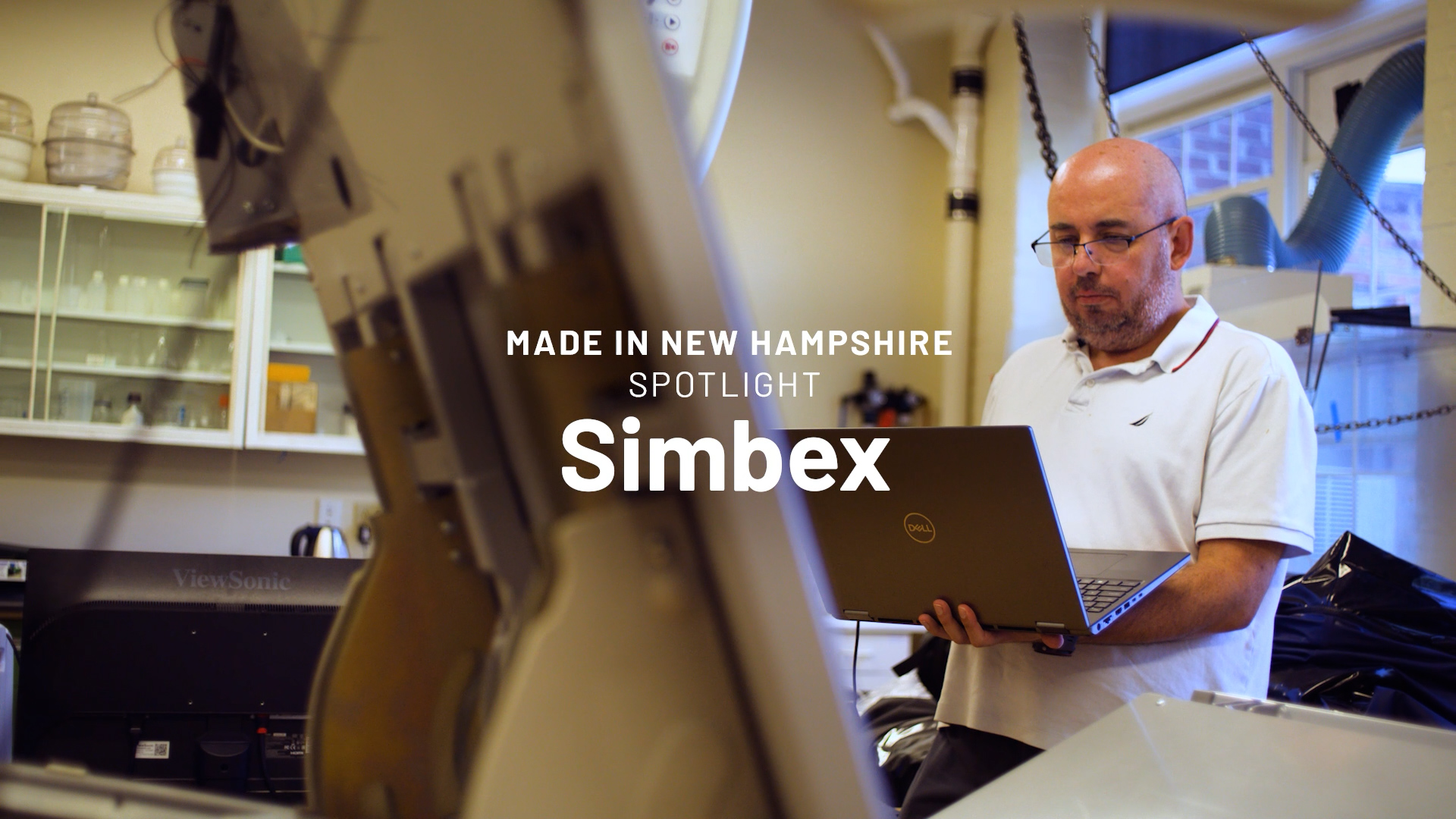 Person holding a laptop