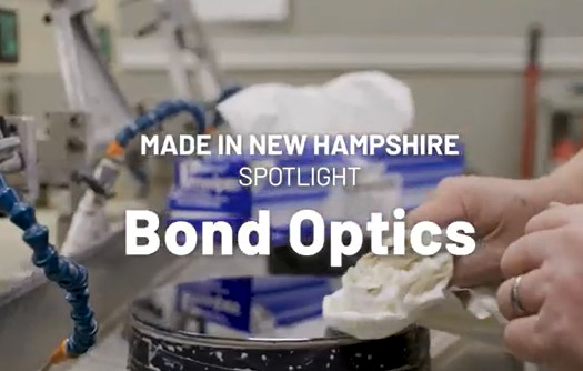 an image of a hand polishing a silver surface with the words "Bond Optics" overlaying the image