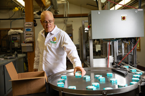 Badger employee testing products in the factory