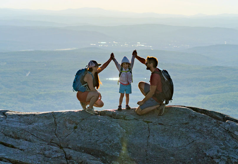 Family on top of mountain