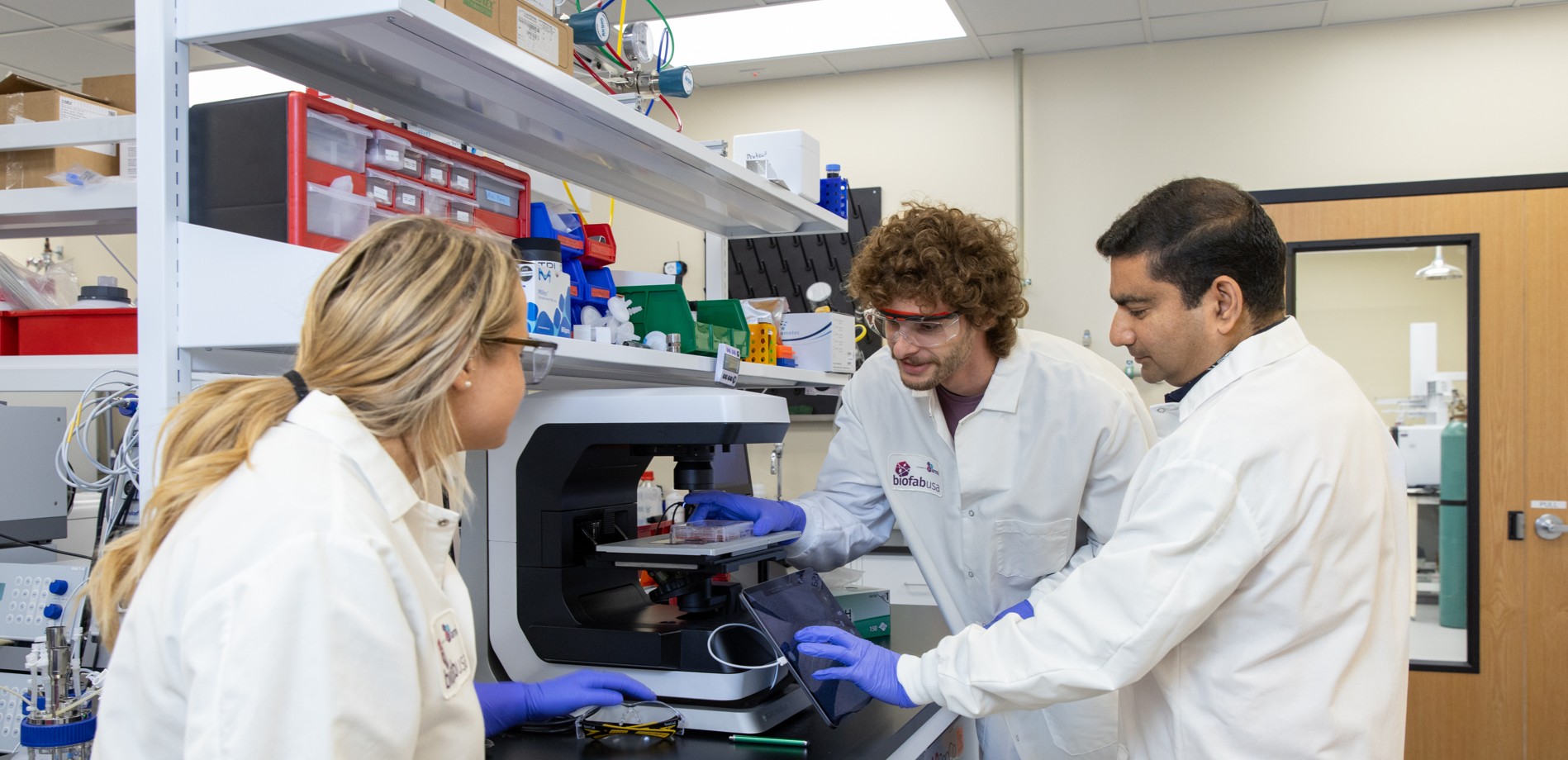 A photo of people in a lab