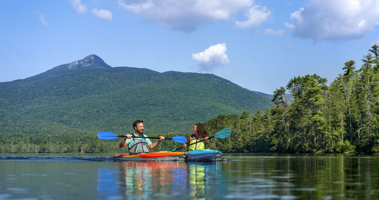 two kayakers on a lake
