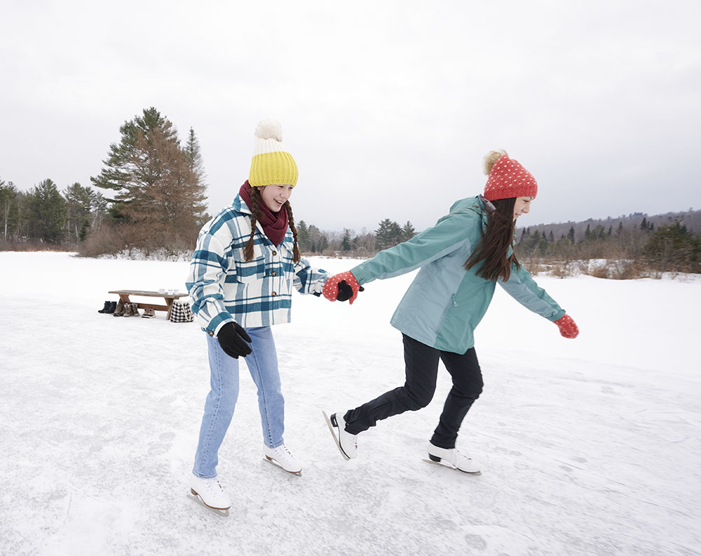 two girls ice skating
