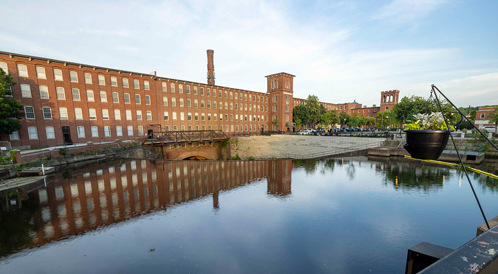 Cocheco Mill Courtyard in downtown Dover on a warm summer evening.