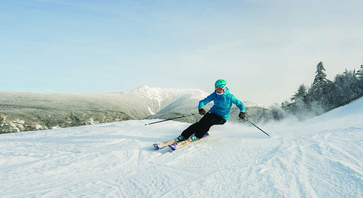 expert skier skiing down a mountain