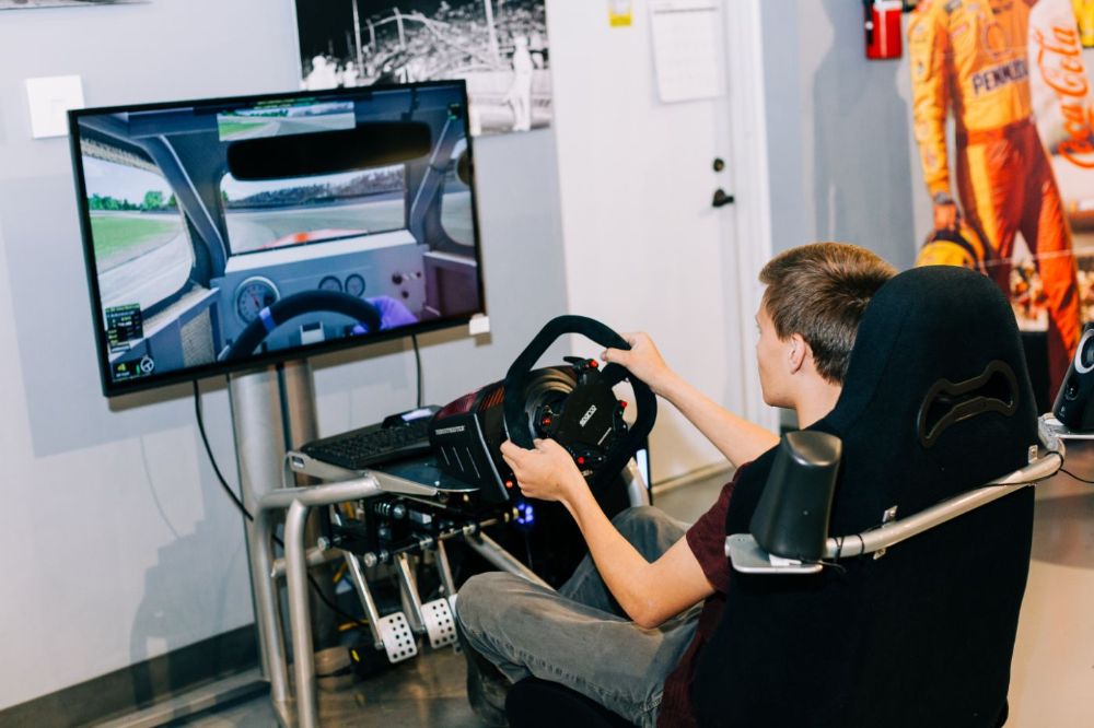 Everyone will enjoy taking a turn on the iRacing Simulator!