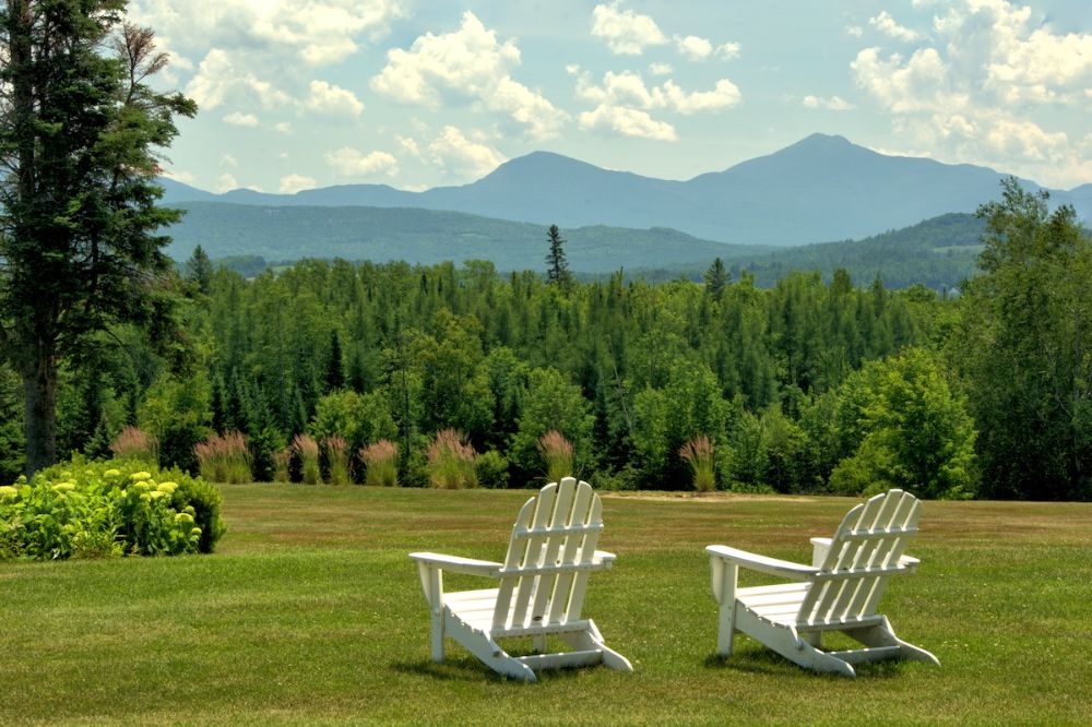 Adirondack chairs with views of the White Mountains