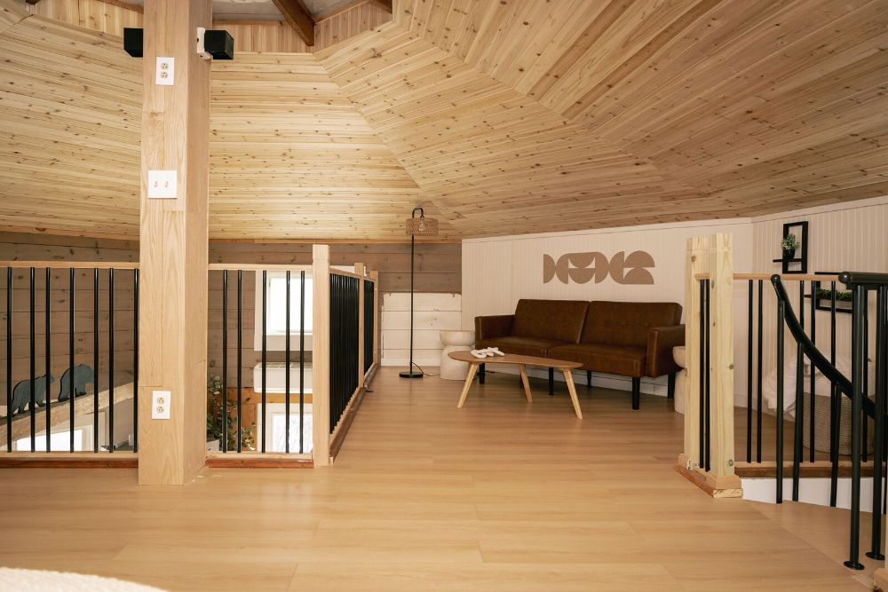 Cozy upstairs lounge with sofa bed for relaxing