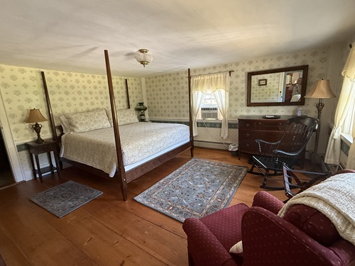 The Blair Room features a king-sized handcrafted four poster walnut bed.